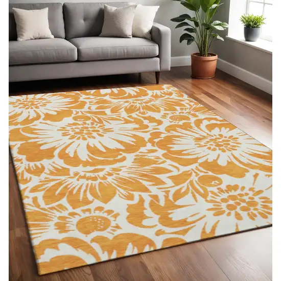 Orange And Ivory Floral Washable Area Rug With UV Protection Photo 2