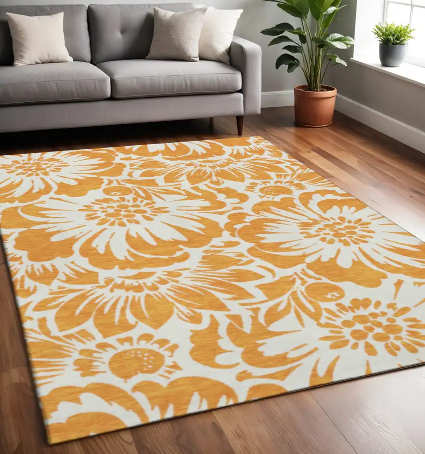 Orange And Ivory Floral Washable Area Rug With UV Protection Photo 2