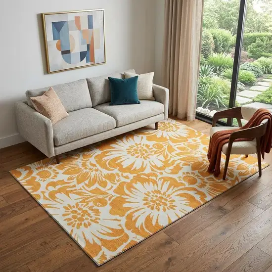 Orange And Ivory Floral Washable Area Rug With UV Protection Photo 1