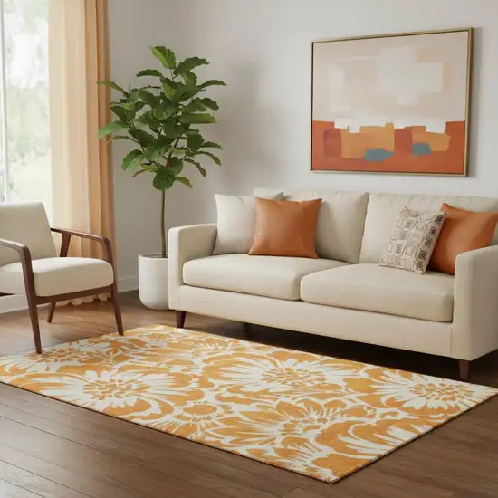Orange And Ivory Floral Washable Area Rug With UV Protection Photo 1