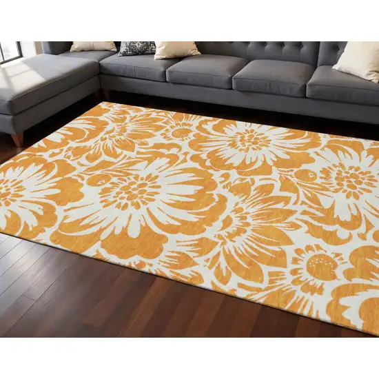 Orange And Ivory Floral Washable Area Rug With UV Protection Photo 2
