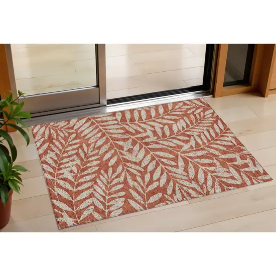 Orange And Ivory Floral Washable Indoor Outdoor Area Rug Photo 1