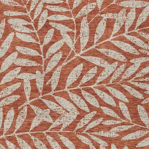 Photo of Orange And Ivory Floral Washable Indoor Outdoor Area Rug