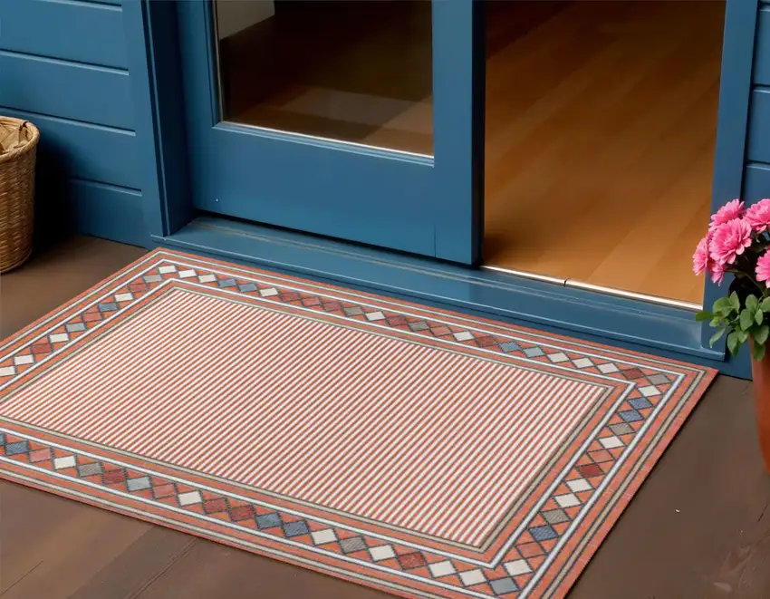 Orange And Ivory Geometric Indoor Outdoor Area Rug Photo 1