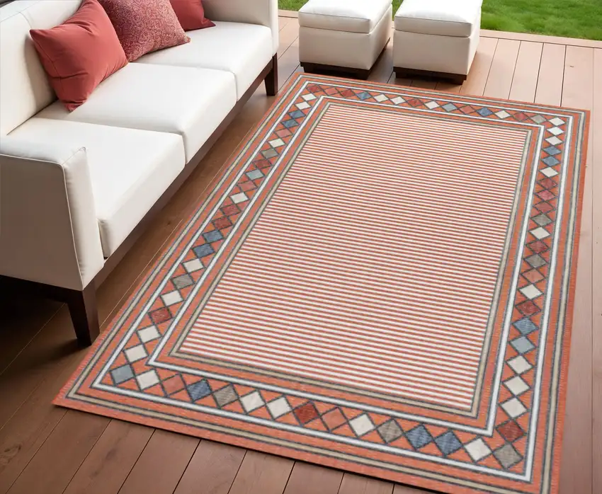 Orange And Ivory Geometric Indoor Outdoor Area Rug Photo 1