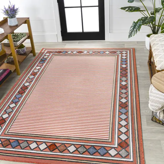 Orange And Ivory Geometric Indoor Outdoor Area Rug Photo 5