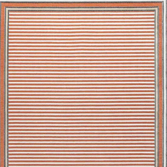 Orange And Ivory Geometric Indoor Outdoor Area Rug Photo 2