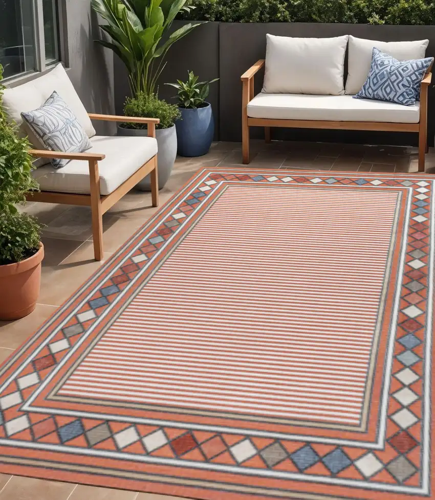 Orange And Ivory Geometric Indoor Outdoor Area Rug Photo 1