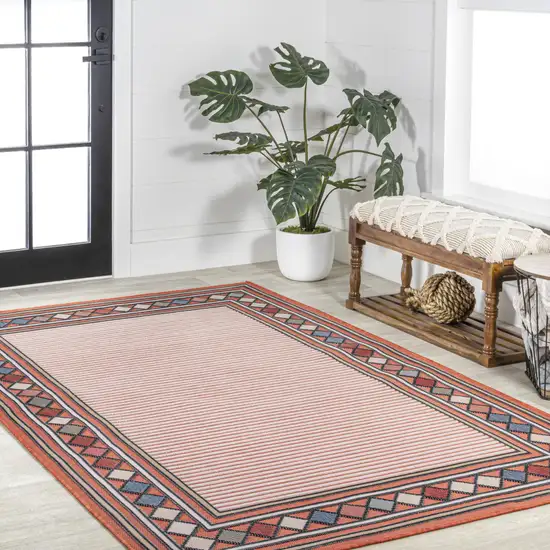 Orange And Ivory Geometric Indoor Outdoor Area Rug Photo 8