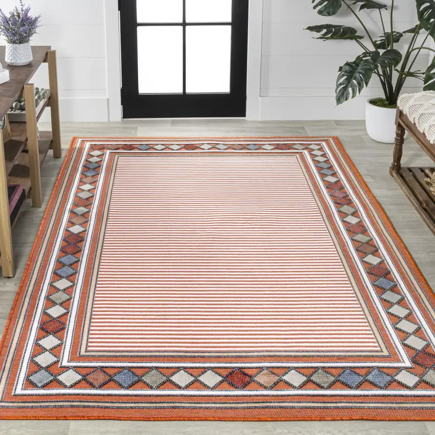 Orange And Ivory Geometric Indoor Outdoor Area Rug Photo 7