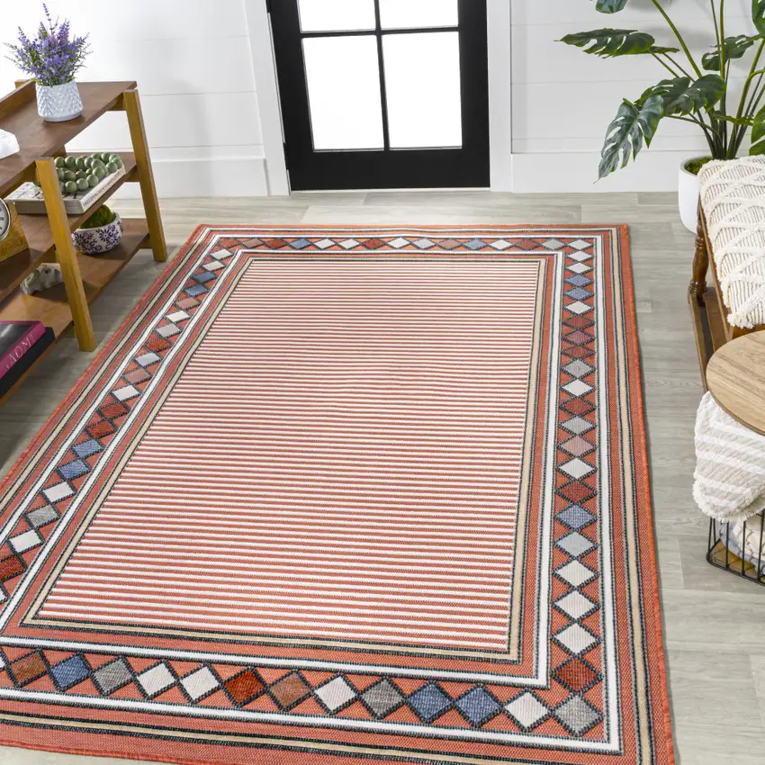 Orange And Ivory Geometric Indoor Outdoor Area Rug Photo 5