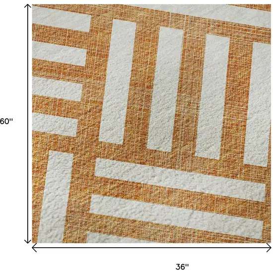 Orange And Ivory Geometric Washable Area Rug With UV Protection Photo 9