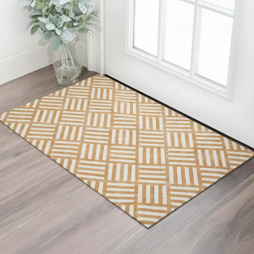 Orange And Ivory Geometric Washable Area Rug With UV Protection Photo 1