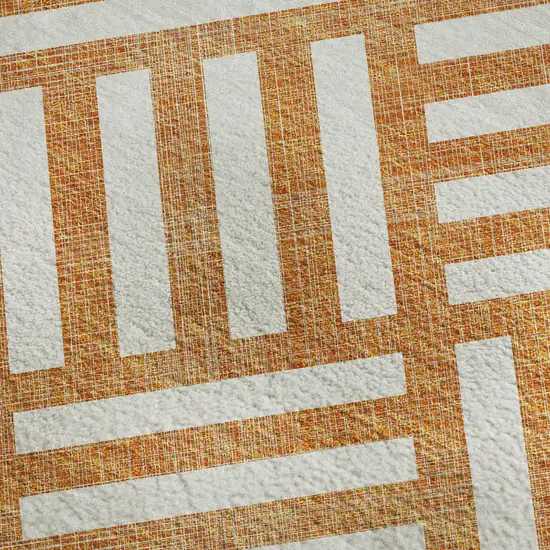 Orange And Ivory Geometric Washable Area Rug With UV Protection Photo 2