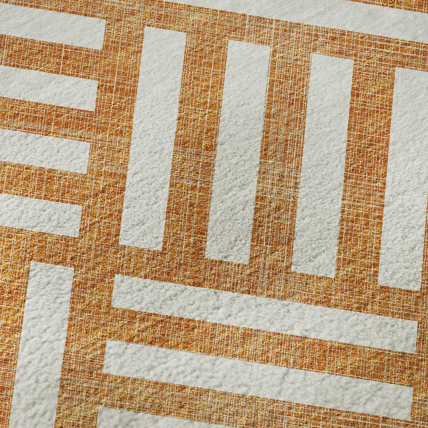 Orange And Ivory Geometric Washable Area Rug With UV Protection Photo 1