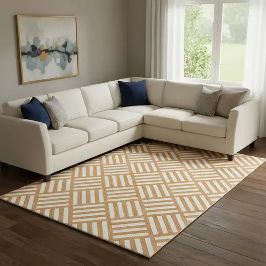 Orange And Ivory Geometric Washable Area Rug With UV Protection Photo 1