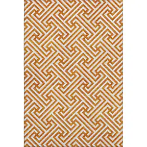 Photo of Orange And Ivory Geometric Washable Area Rug With UV Protection