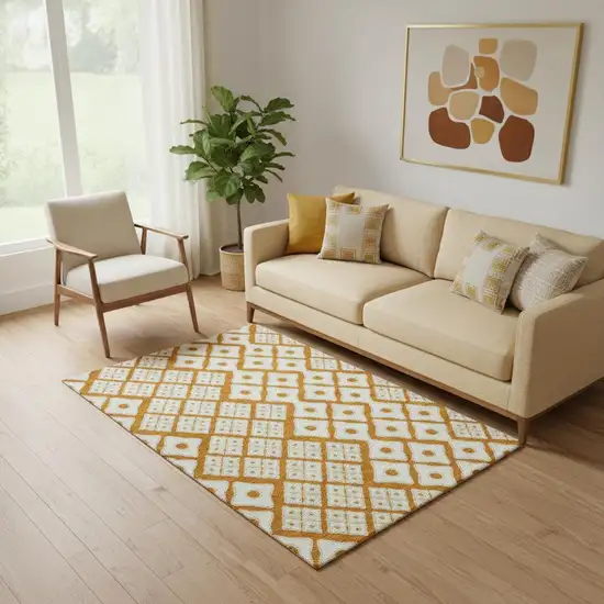 Orange And Ivory Geometric Washable Area Rug With UV Protection Photo 1