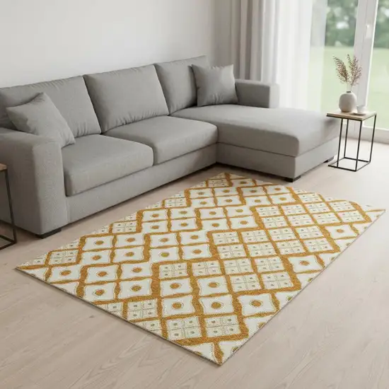 Orange And Ivory Geometric Washable Area Rug With UV Protection Photo 1