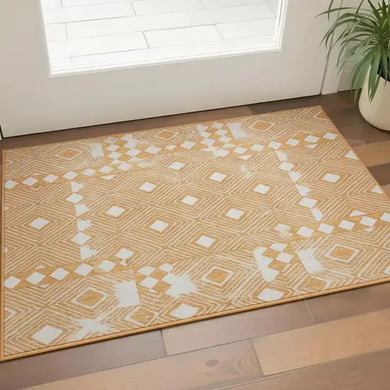Orange And Ivory Geometric Washable Area Rug With UV Protection Photo 2