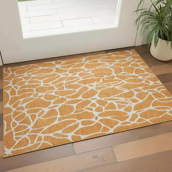 Orange And Ivory Geometric Washable Area Rug With UV Protection Photo 2