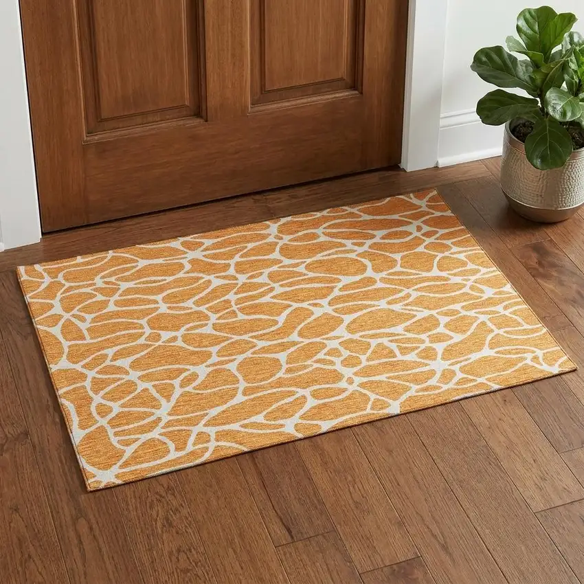 Orange And Ivory Geometric Washable Area Rug With UV Protection Photo 1