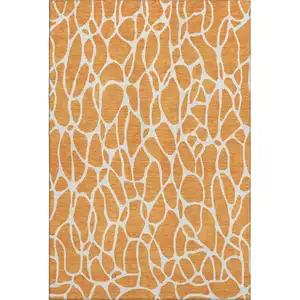 Photo of Orange And Ivory Geometric Washable Area Rug With UV Protection