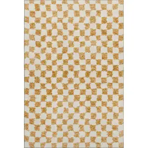 Photo of Orange And Ivory Geometric Washable Area Rug With UV Protection