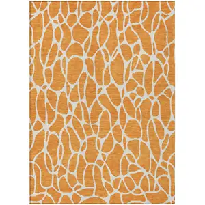 Photo of Orange And Ivory Geometric Washable Indoor Outdoor Area Rug
