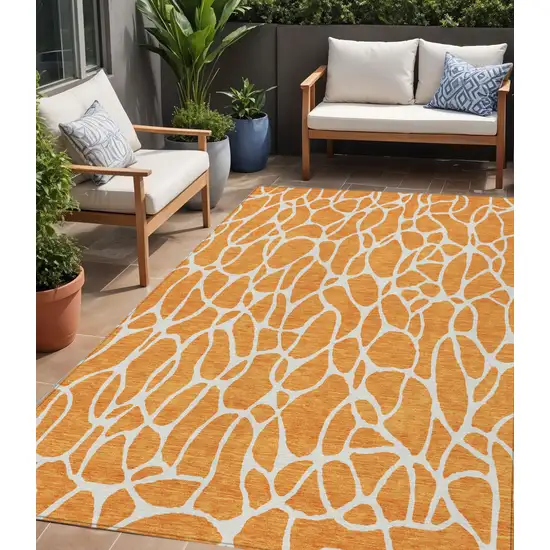 Orange And Ivory Geometric Washable Indoor Outdoor Area Rug Photo 1