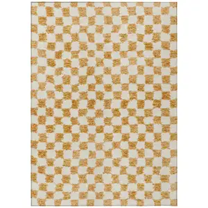 Photo of Orange And Ivory Geometric Washable Indoor Outdoor Area Rug