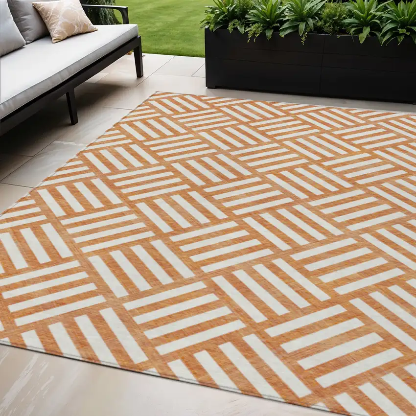 Orange And Ivory Geometric Washable Indoor Outdoor Area Rug Photo 1