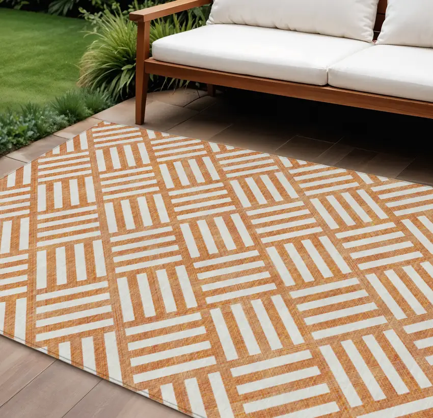 Orange And Ivory Geometric Washable Indoor Outdoor Area Rug Photo 1
