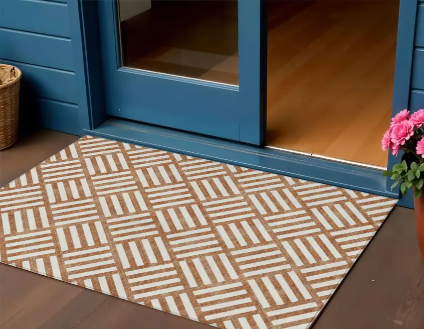 Orange And Ivory Geometric Washable Indoor Outdoor Area Rug Photo 1