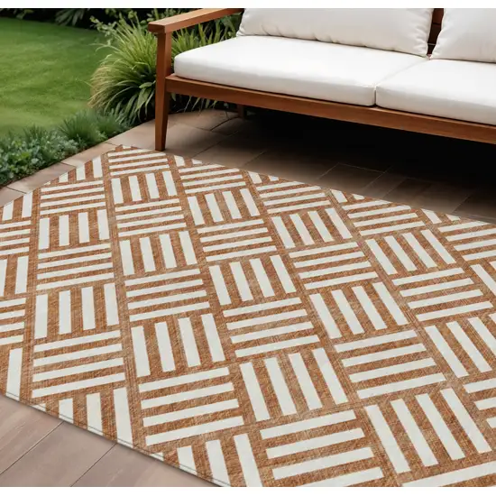 Orange And Ivory Geometric Washable Indoor Outdoor Area Rug Photo 1
