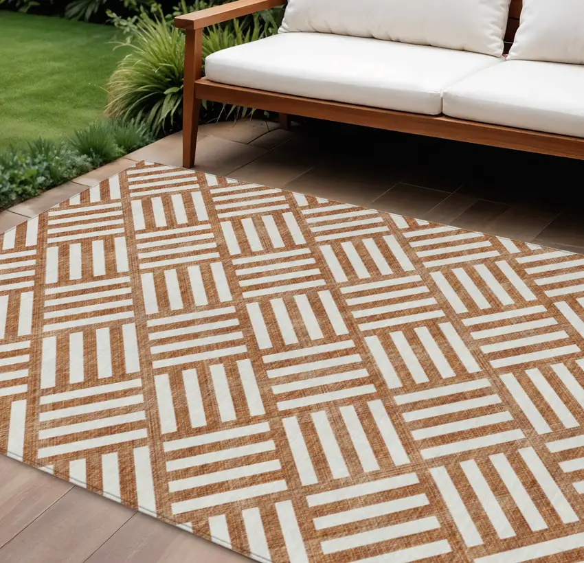 Orange And Ivory Geometric Washable Indoor Outdoor Area Rug Photo 1