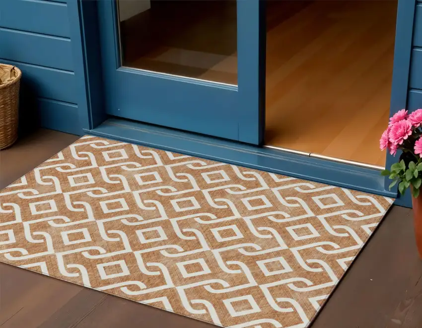 Orange And Ivory Geometric Washable Indoor Outdoor Area Rug Photo 1