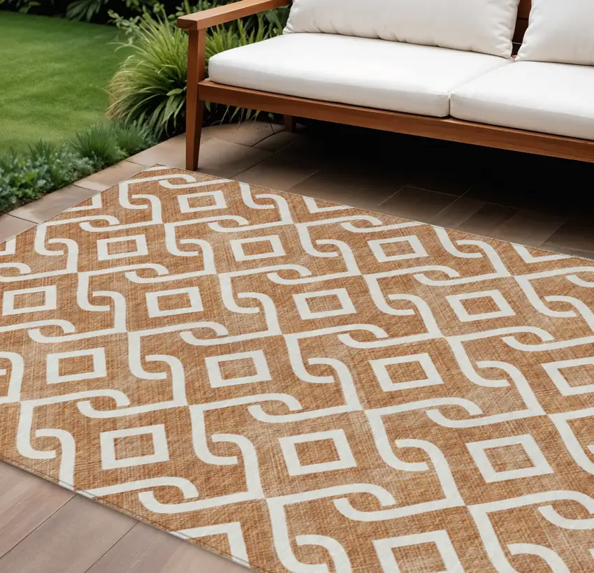 Orange And Ivory Geometric Washable Indoor Outdoor Area Rug Photo 1