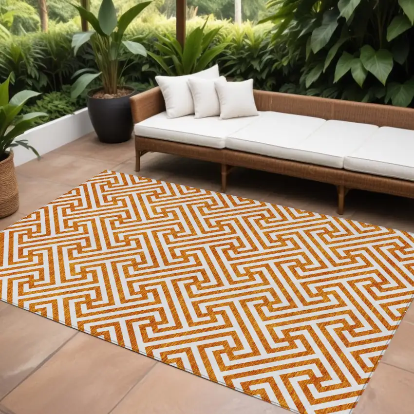 Orange And Ivory Geometric Washable Indoor Outdoor Area Rug Photo 1