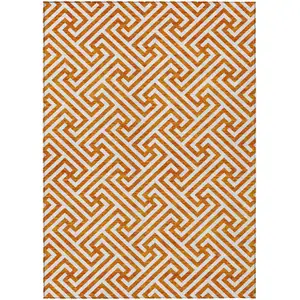 Photo of Orange And Ivory Geometric Washable Indoor Outdoor Area Rug