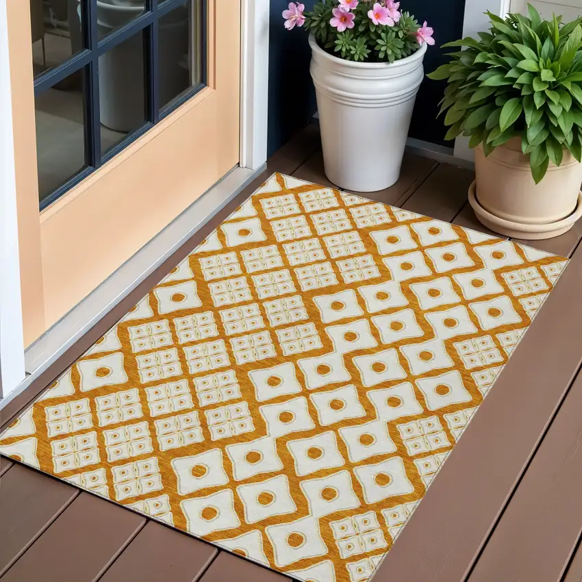 Orange And Ivory Geometric Washable Indoor Outdoor Area Rug Photo 1