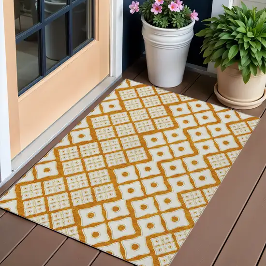 Orange And Ivory Geometric Washable Indoor Outdoor Area Rug Photo 1
