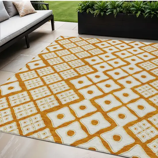 Orange And Ivory Geometric Washable Indoor Outdoor Area Rug Photo 1