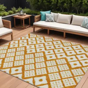 Photo of Orange And Ivory Geometric Washable Indoor Outdoor Area Rug