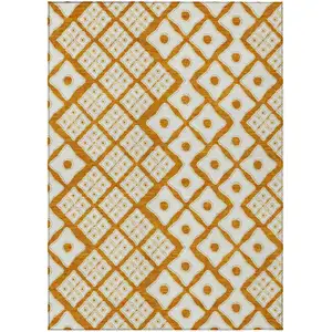 Photo of Orange And Ivory Geometric Washable Indoor Outdoor Area Rug