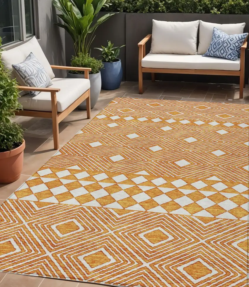 Orange And Ivory Geometric Washable Indoor Outdoor Area Rug Photo 1
