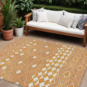 Photo of Orange And Ivory Geometric Washable Indoor Outdoor Area Rug
