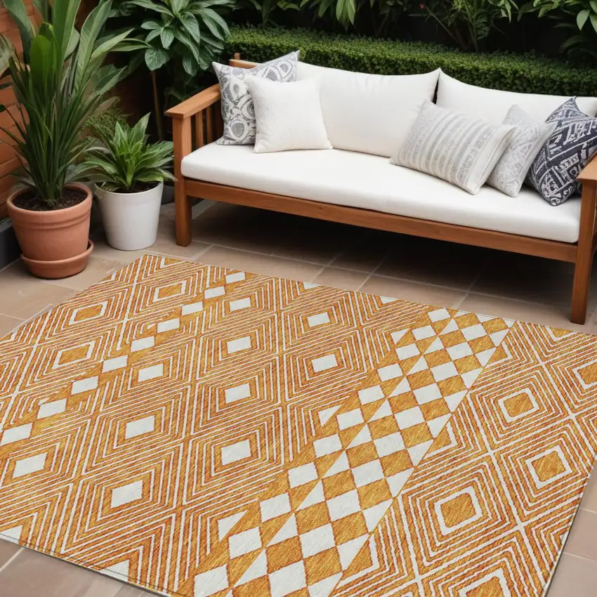 Orange And Ivory Geometric Washable Indoor Outdoor Area Rug Photo 1