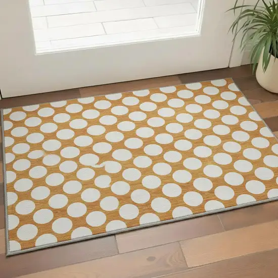 Orange And Ivory Polka Dot Washable Area Rug With UV Protection Photo 2
