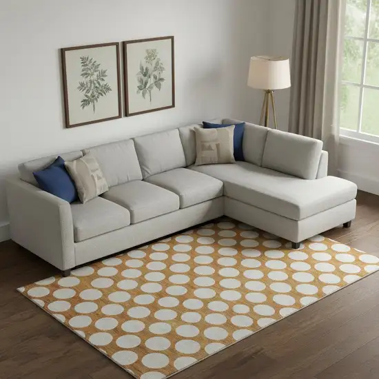 Orange And Ivory Polka Dot Washable Area Rug With UV Protection Photo 1